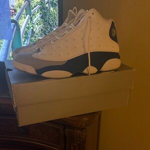 Jordan White and Gray Sneakers with Red Accent
